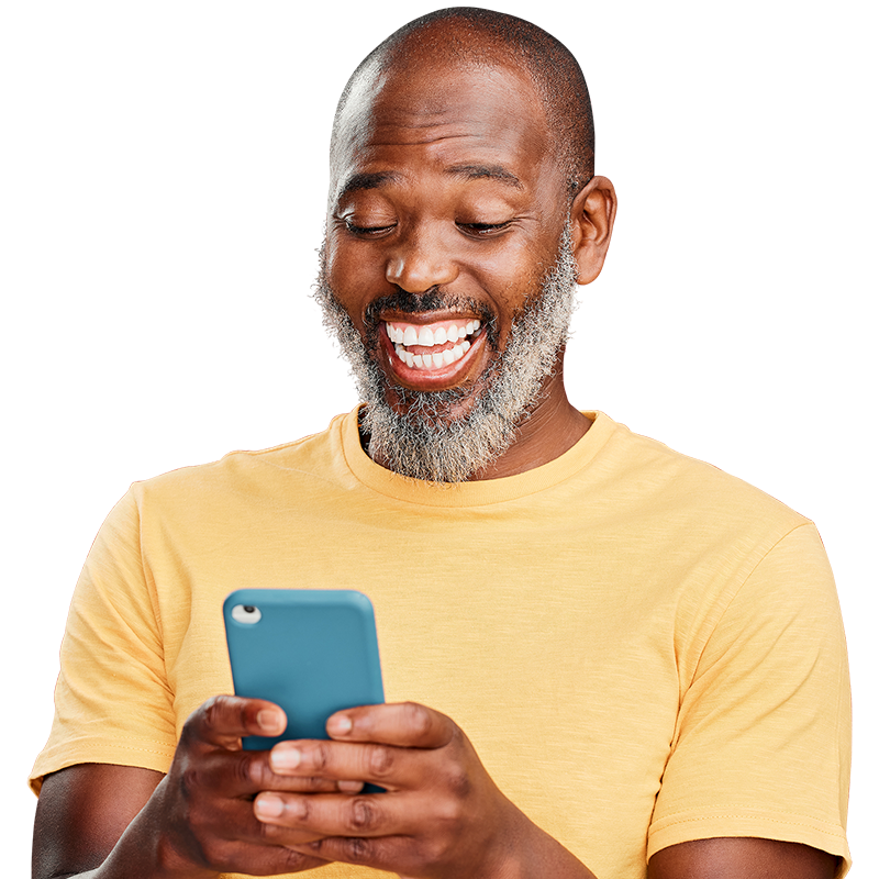 person smiling looking at phone