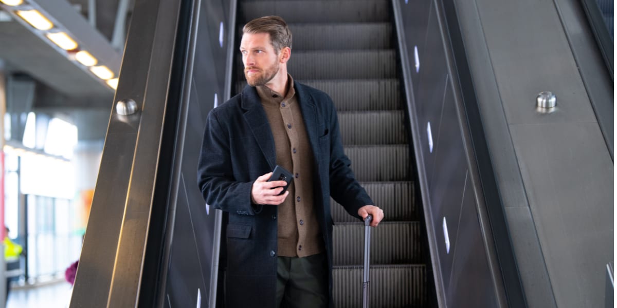 a man on an escalator