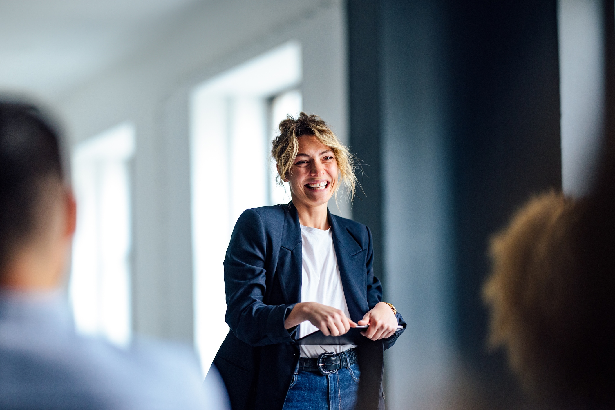 Woman presenting to her colleagues. 