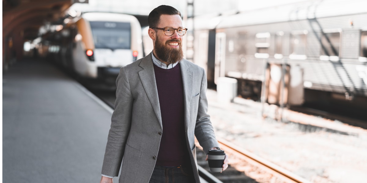 a business traveler at a train station