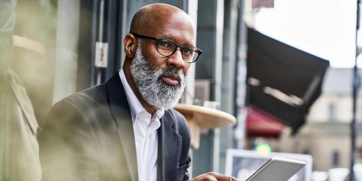 a CFO holding a tablet