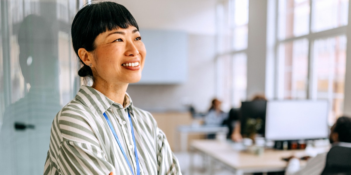 a business leader looking at the window