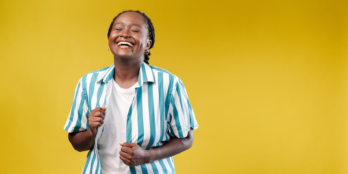 Woman smiling and looking excited 
