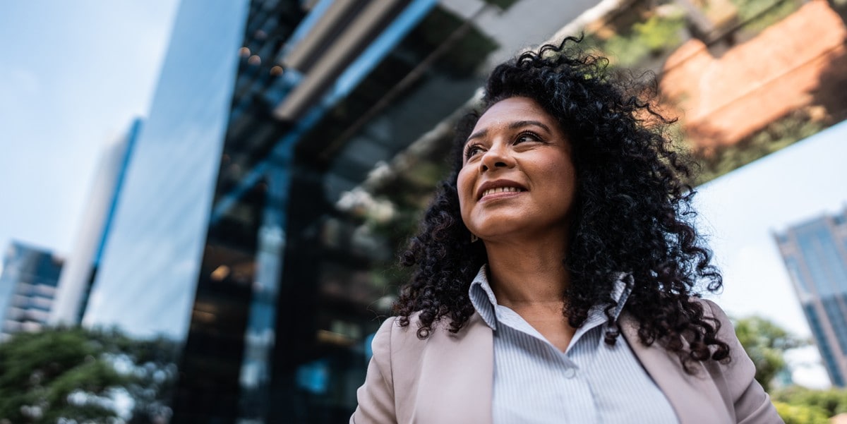 a finance leader smiles confidently