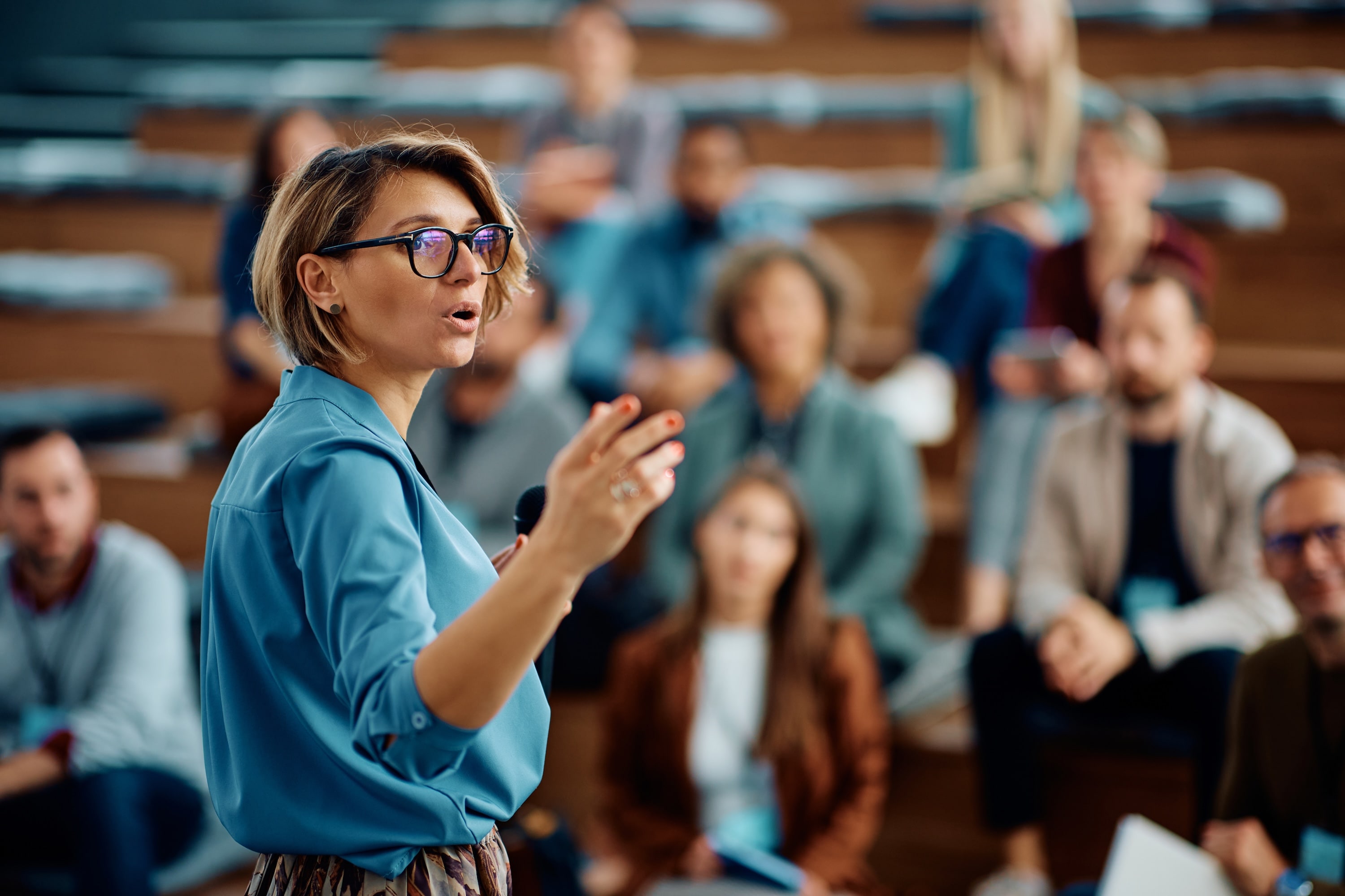Woman teaching students