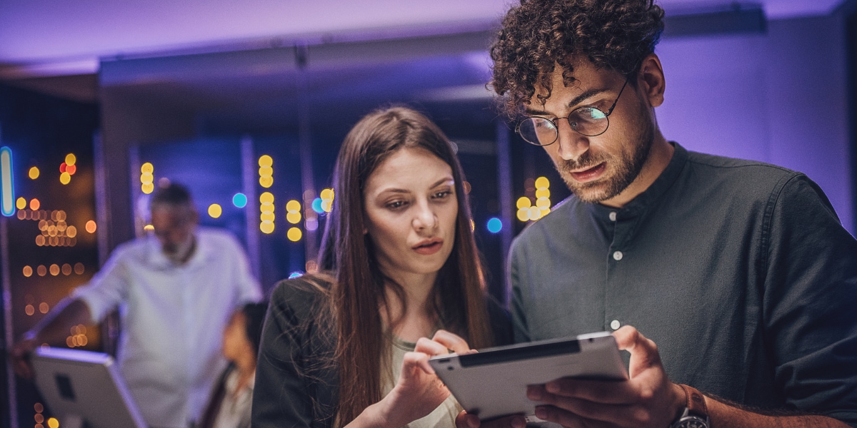 employees comparing business travel solutions