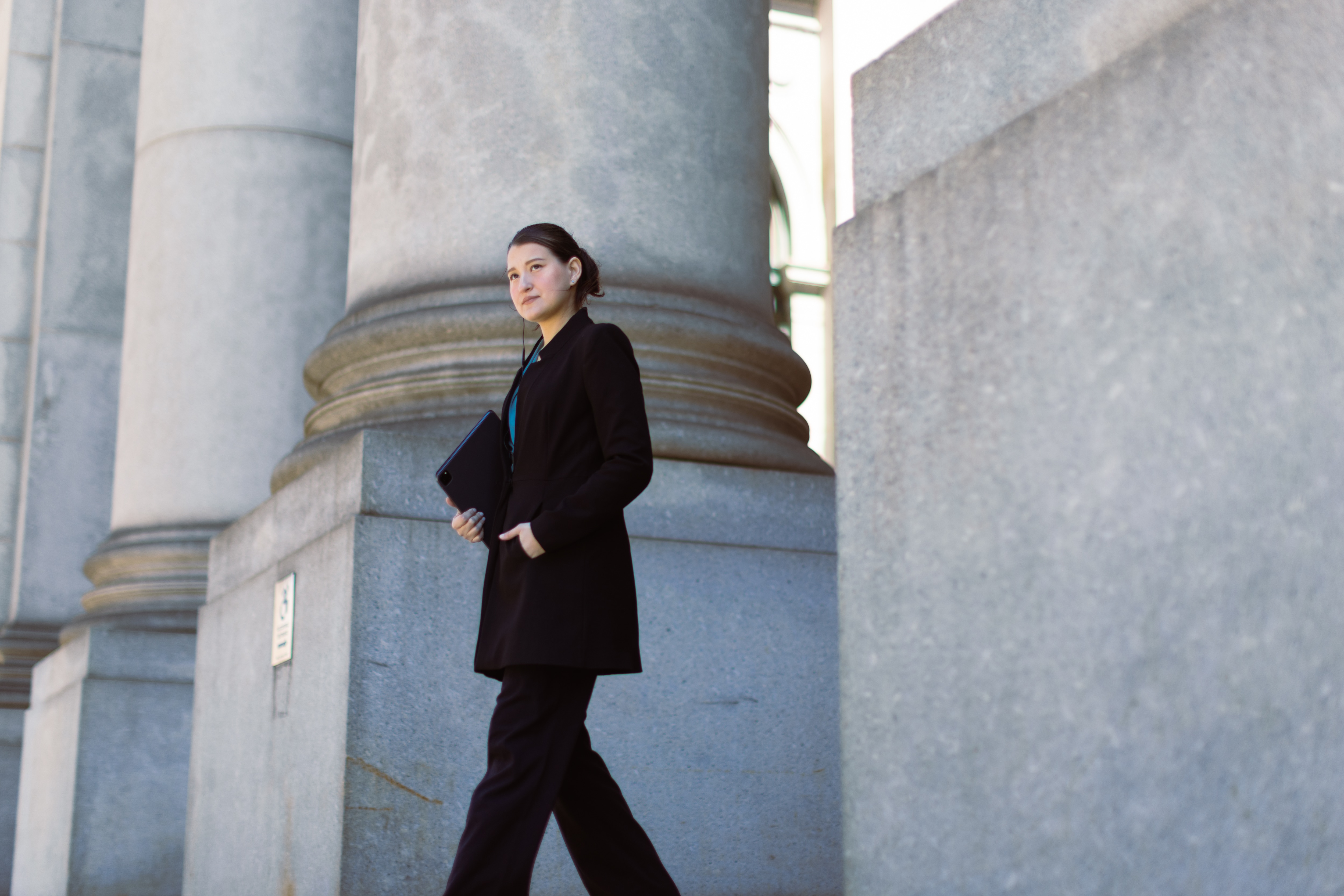 Women walking down the stairs at a government building