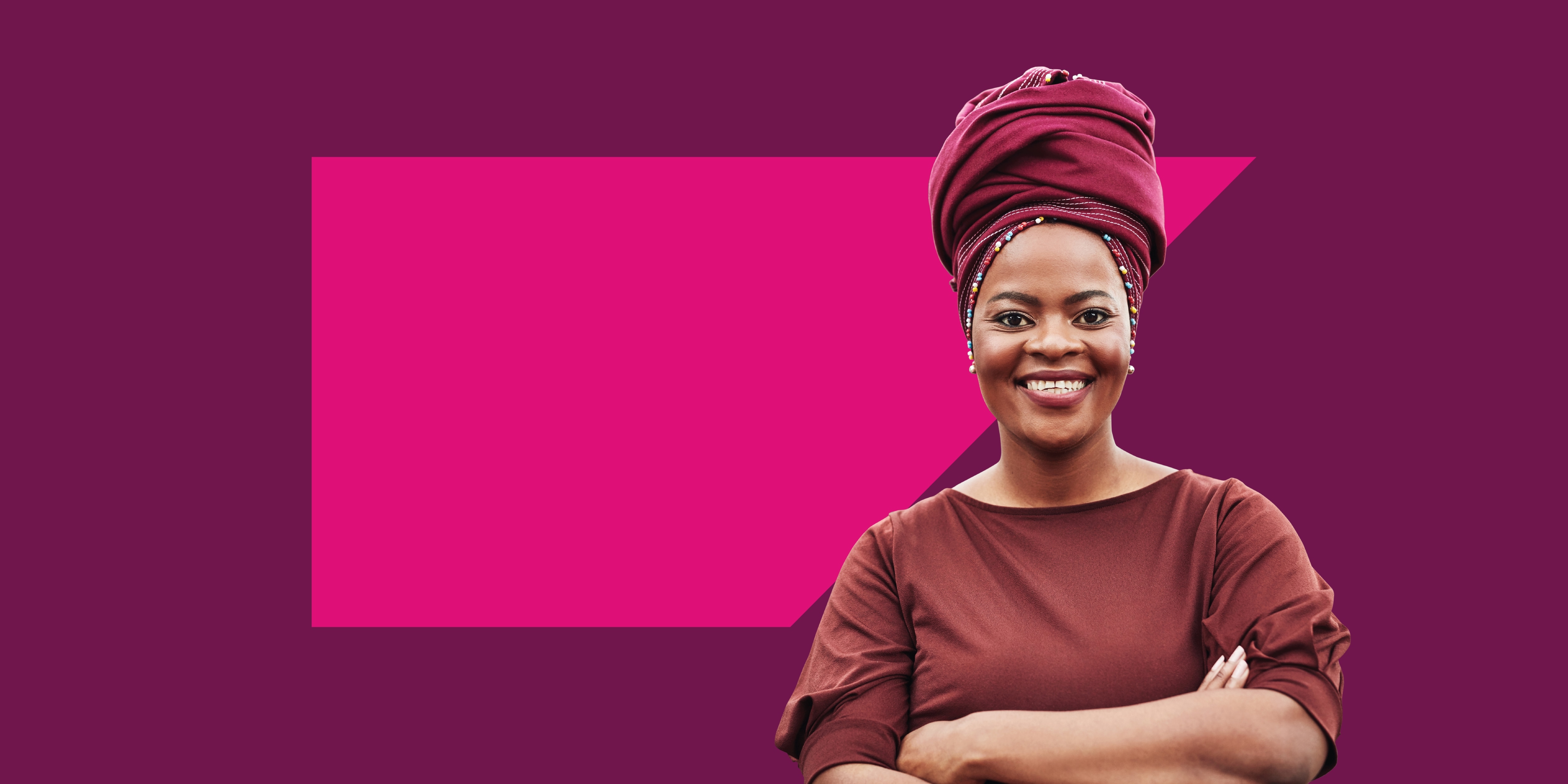 woman standing in front of SAP logo smiling