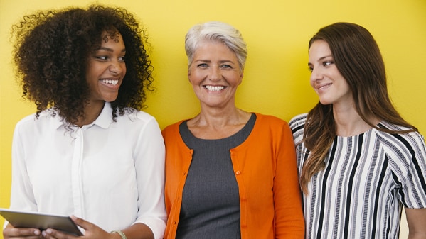 three women smiling