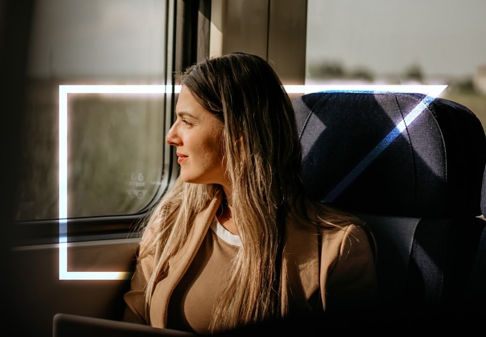 woman looking out window