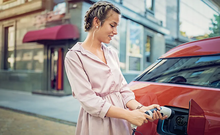 woman pumping gas