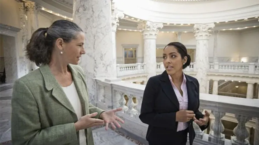 two women speaking