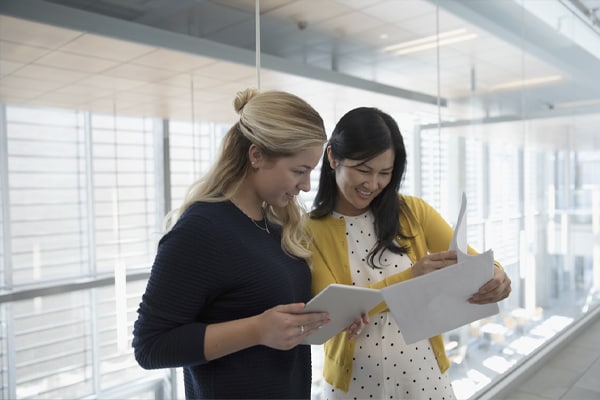 two people working together