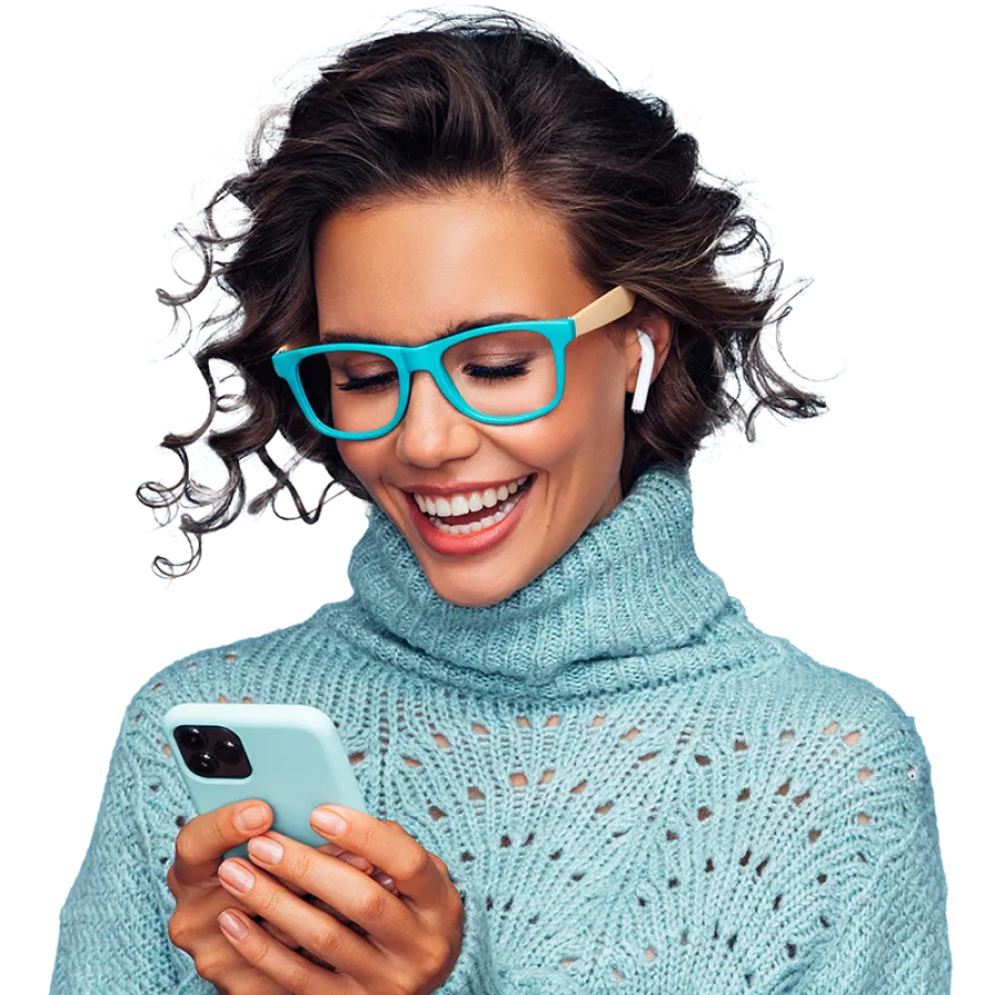 woman holding phone and smiling