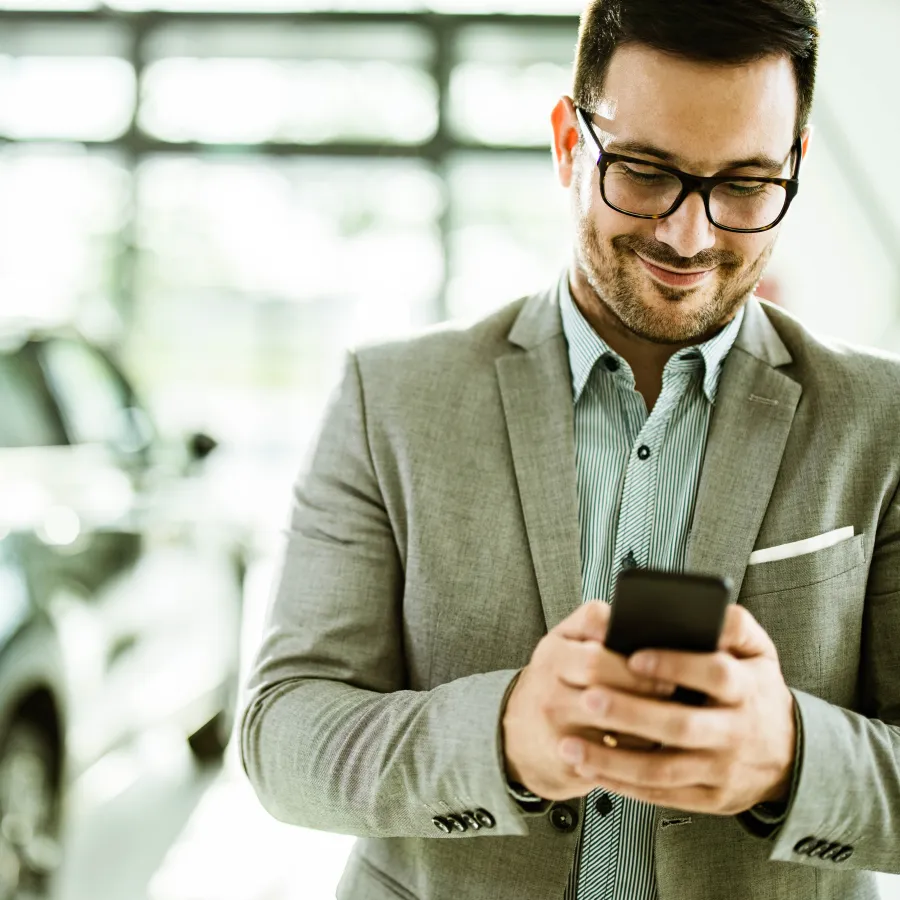man using app on his phone for travel