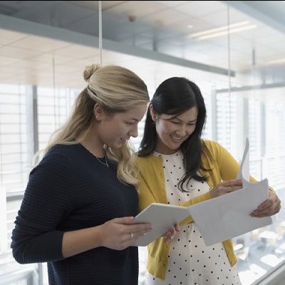 two people working together