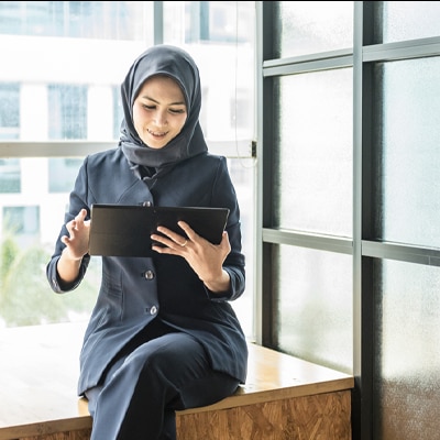 woman working on a tablet