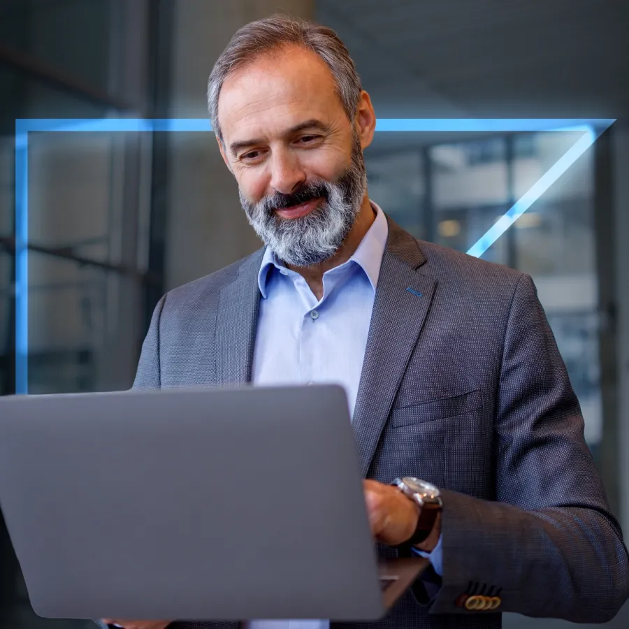 man looking at laptop
